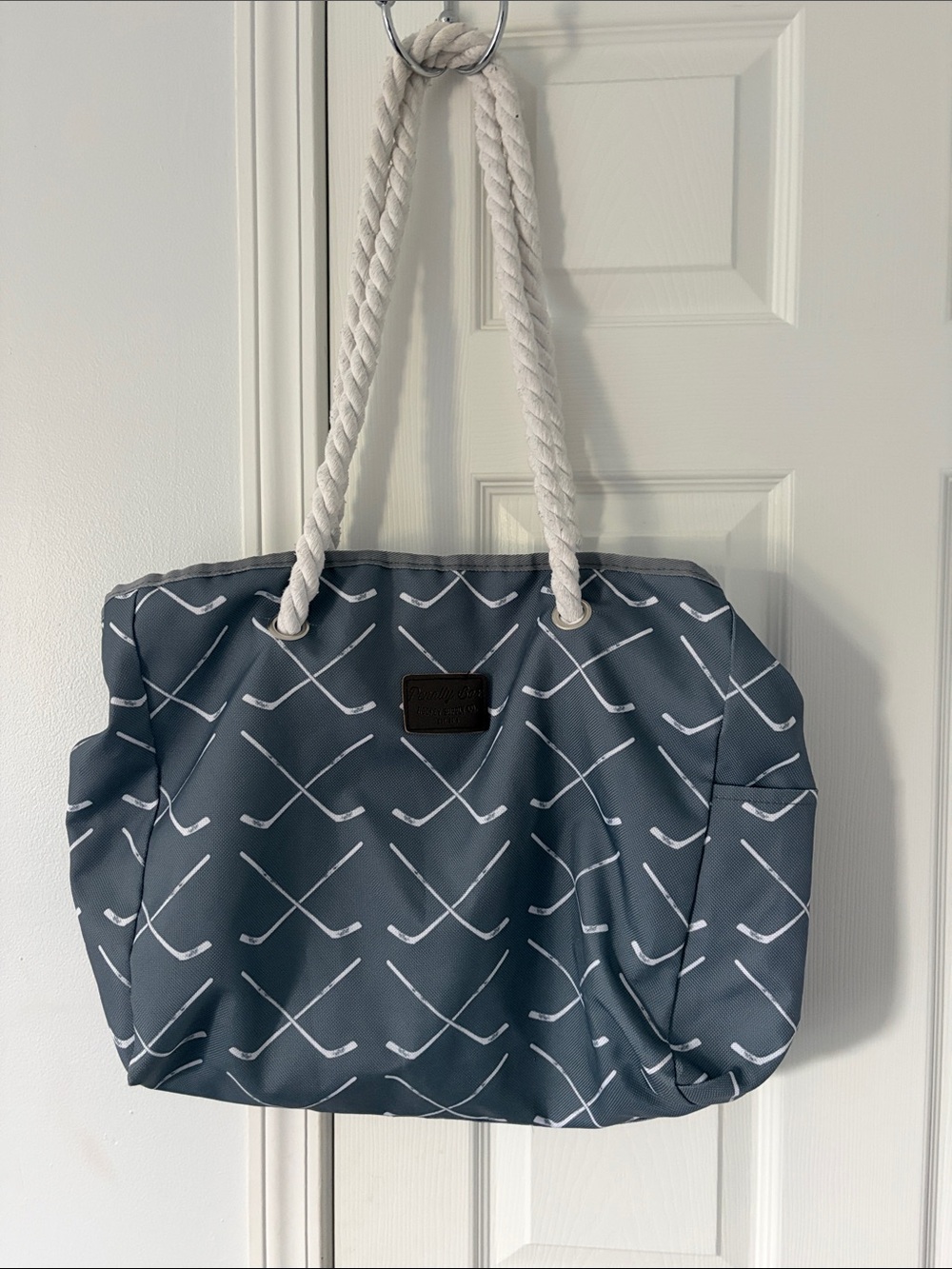Grey Hockey Patterned Tote Bag with Rope Handles and zippered closure